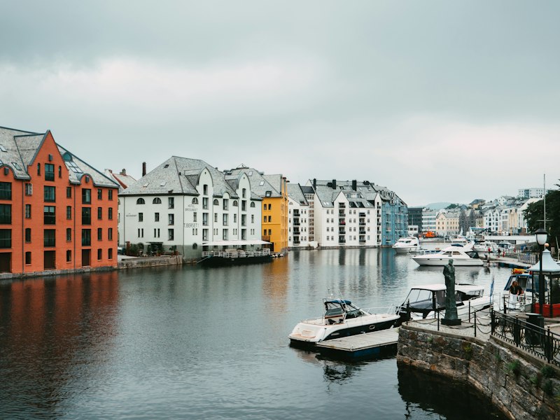 Colourful buildings around the Brosundet harbour in Ålesund